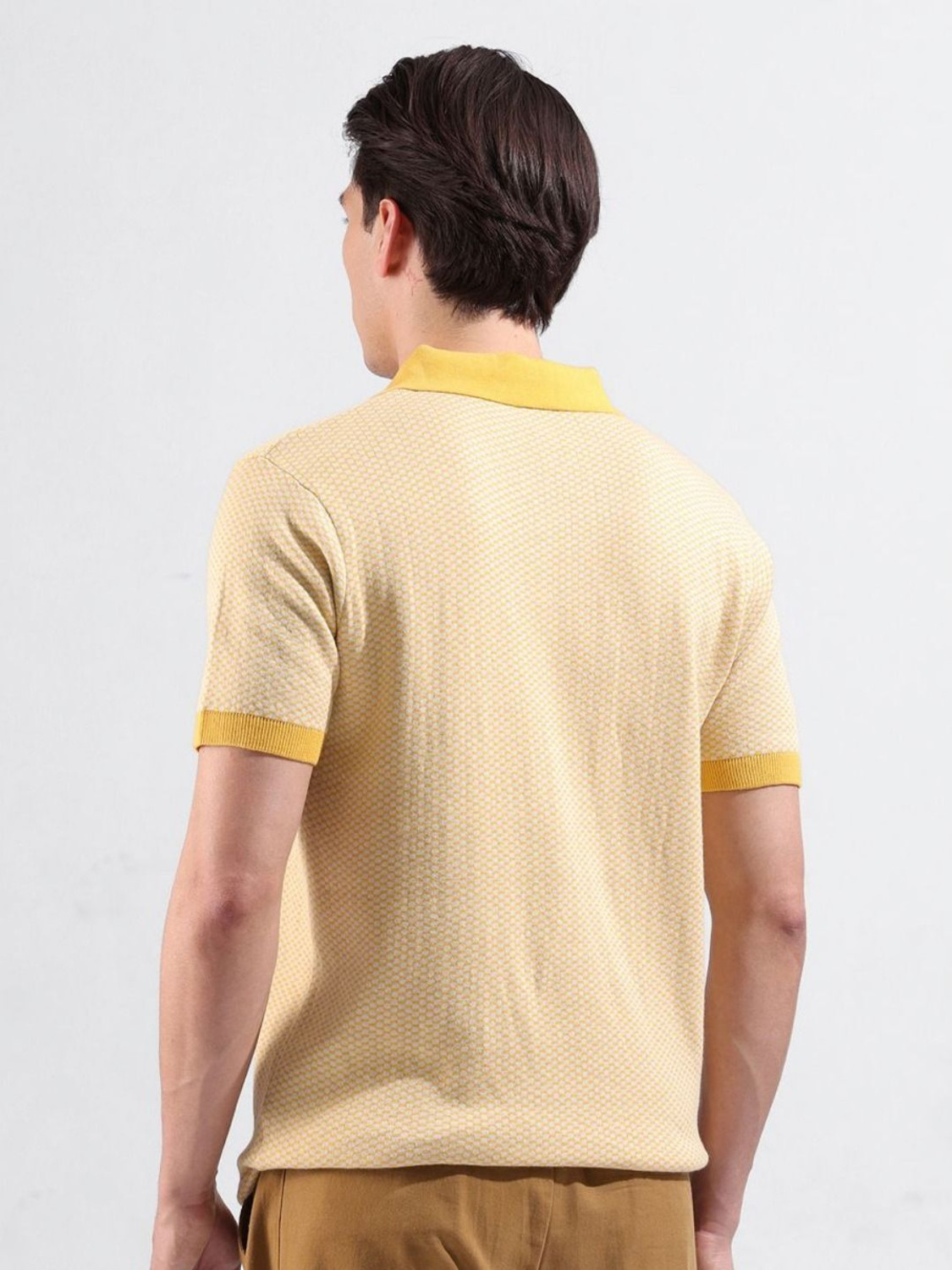 Image of The Indian Garage Co. Self Design Men Polo Neck Yellow T-Shirt