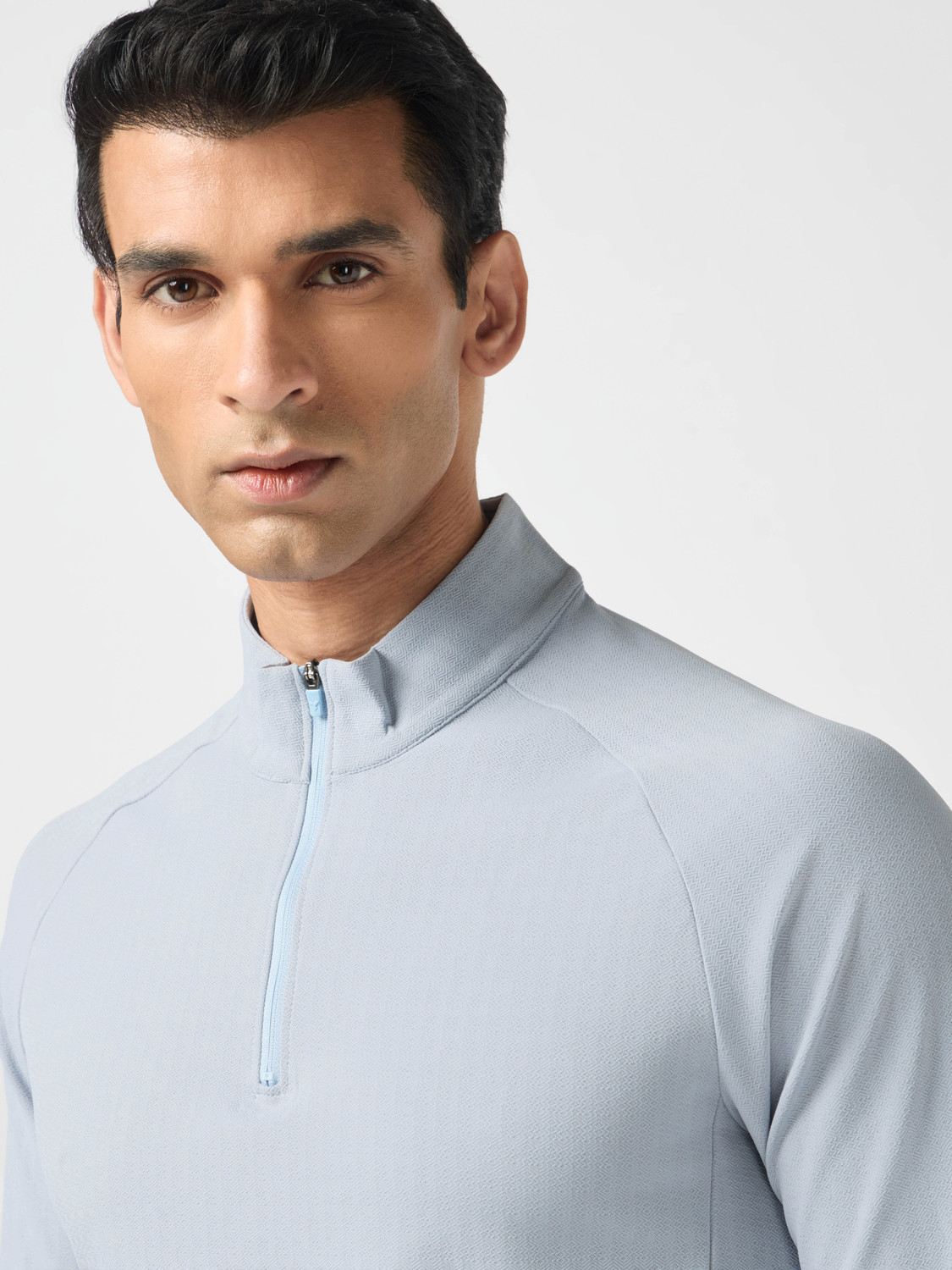 Image of TECHNOSPORT Solid Men Zip Neck Light Blue T-Shirt