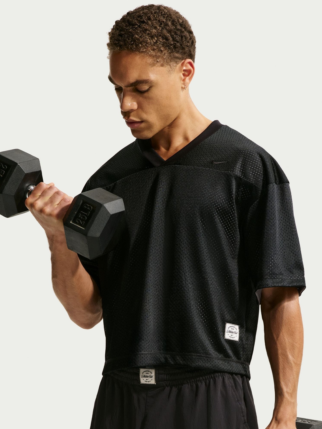 Image of NIKE Solid Men V Neck Black T-Shirt