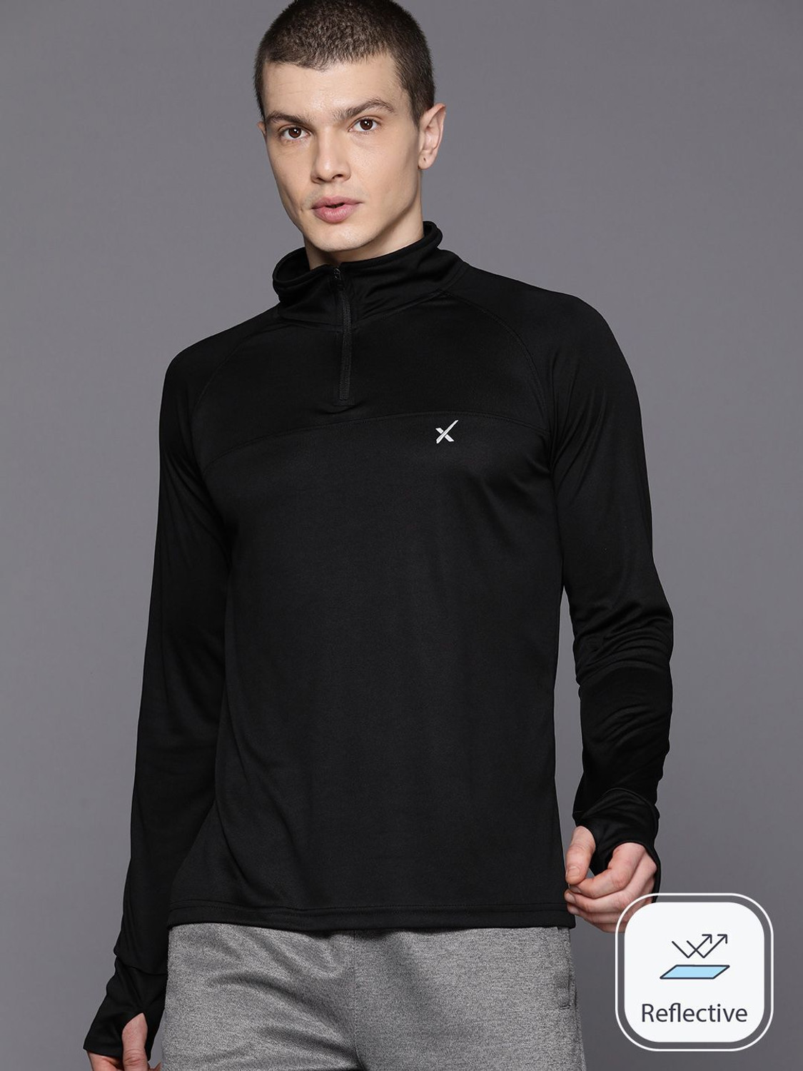 HRX by Hrithik Roshan Solid Men Polo Neck Black T-Shirt