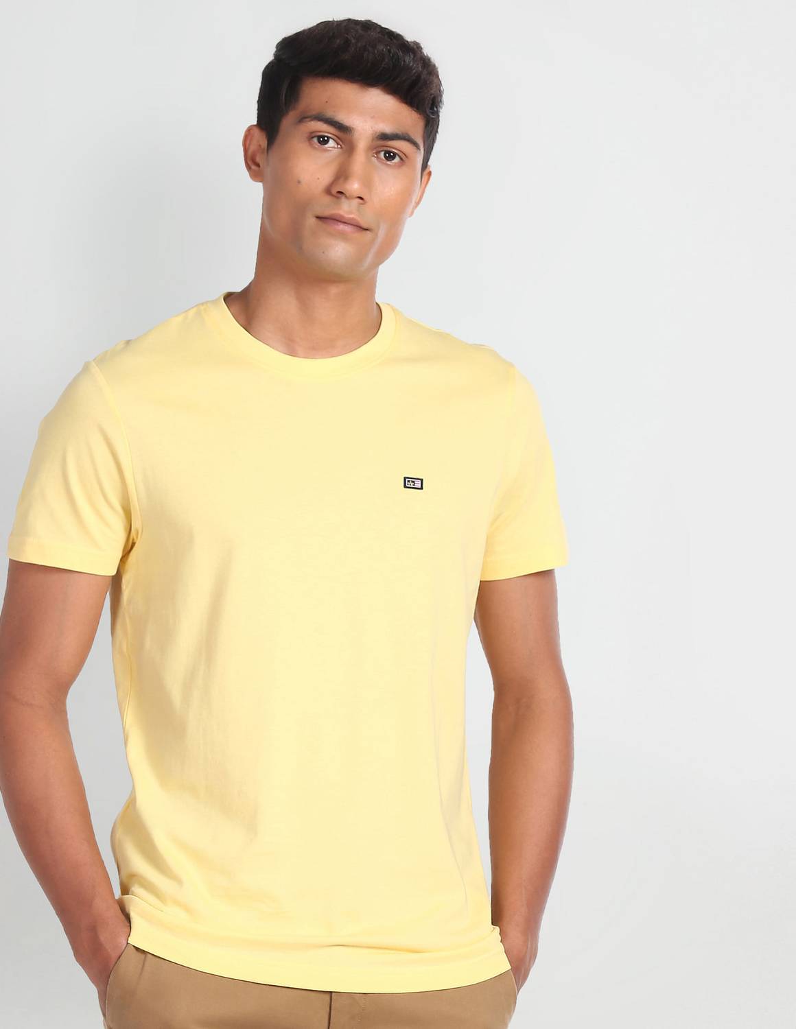 Arrow Sport Solid Men Round Neck Yellow T-Shirt
