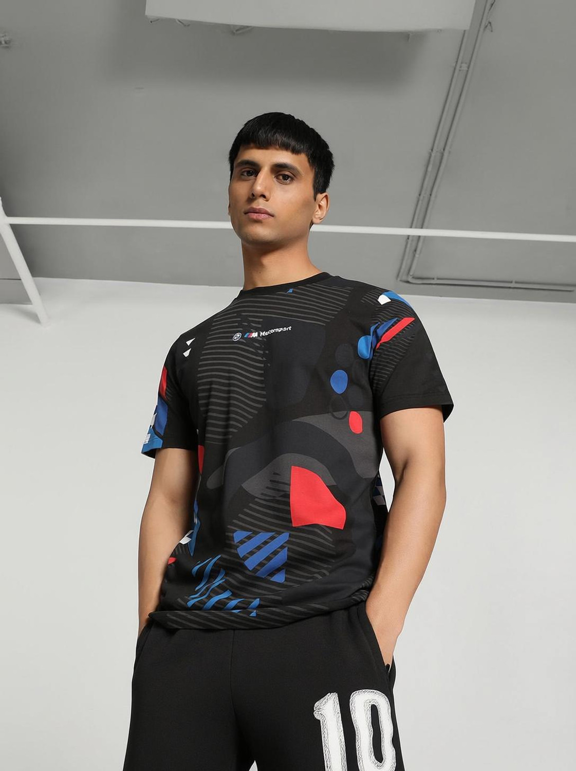 Image of PUMA Printed Men Round Neck Black T-Shirt