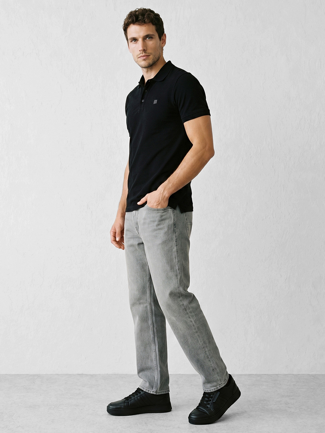 Image of WROGN Solid Men Polo Neck Black T-Shirt