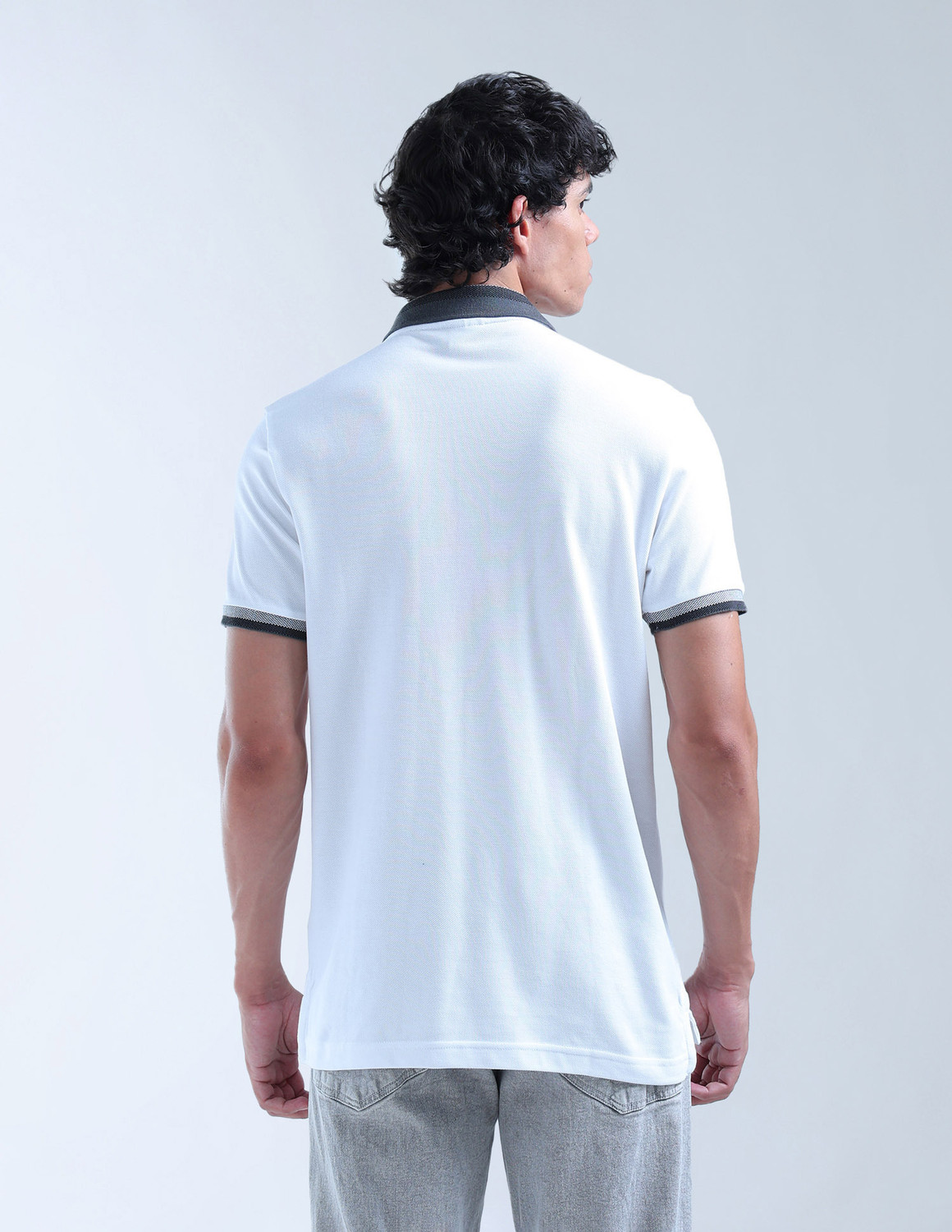 Image of FLYING MACHINE Solid Men Polo Neck White T-Shirt
