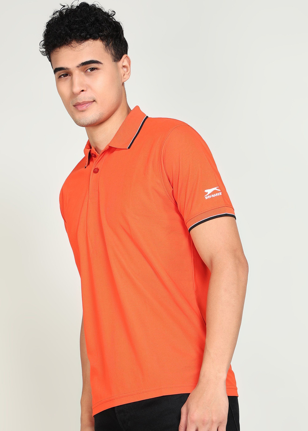 Image of Shiv Naresh Solid Men Polo Neck Orange T-Shirt