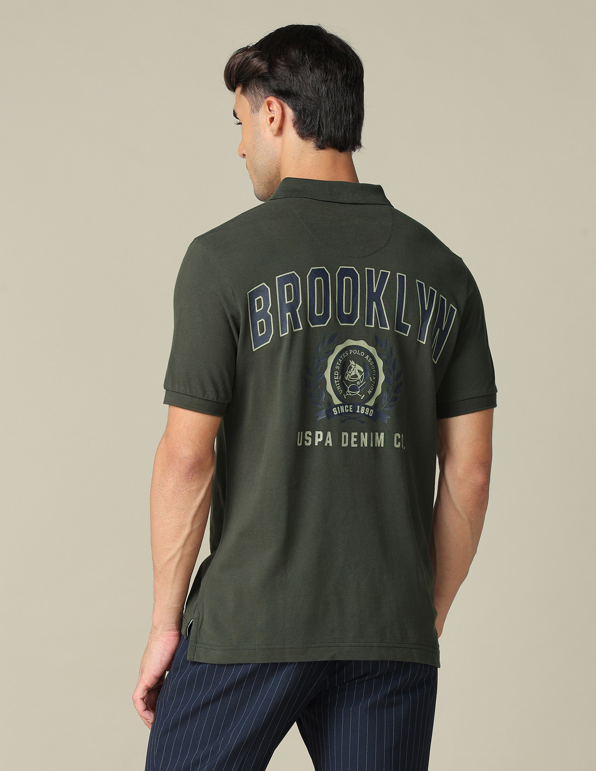 Image of U.S. Polo Assn. Denim Co. Solid Men Polo Neck Green T-Shirt