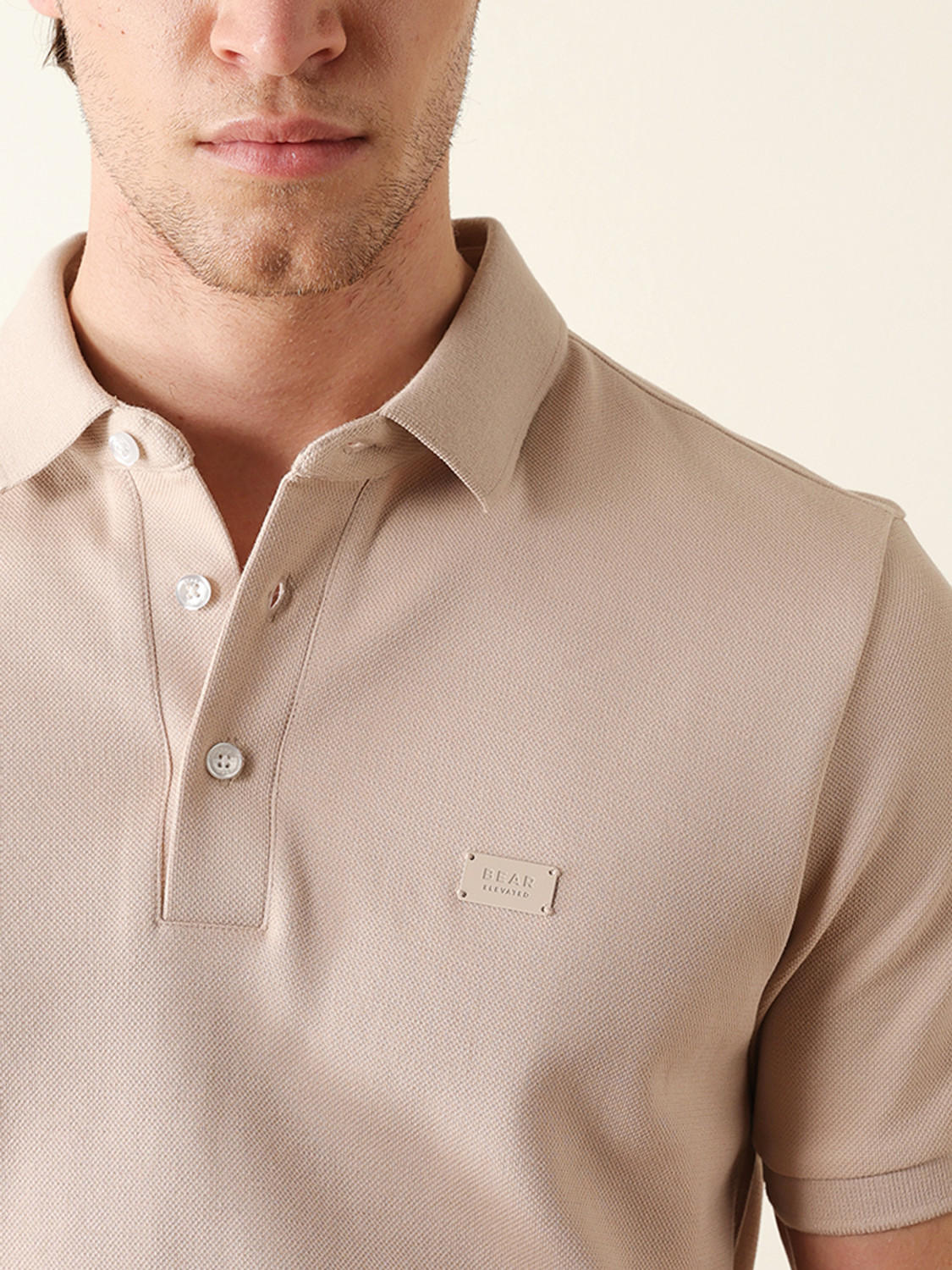Image of THE BEAR HOUSE Solid Men Polo Neck Beige T-Shirt