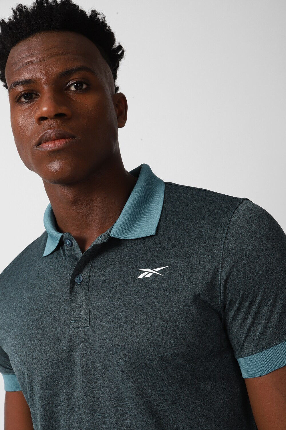 Image of REEBOK Printed Men Polo Neck Blue T-Shirt
