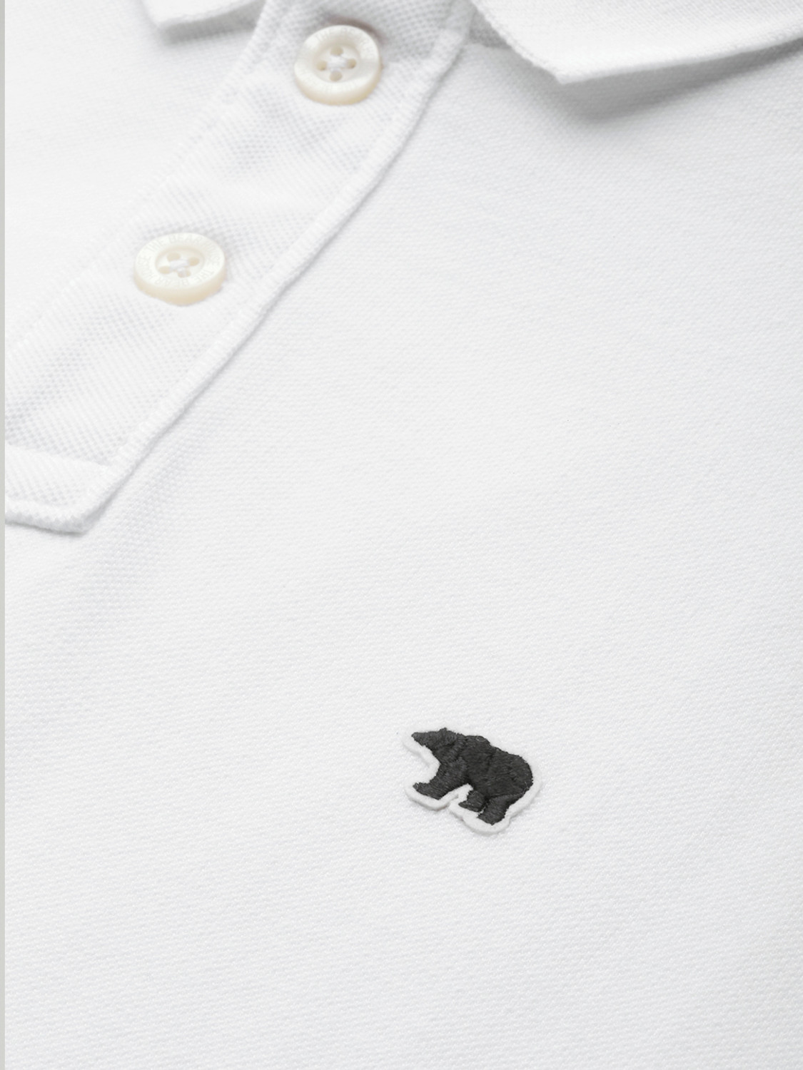 Image of THE BEAR HOUSE Solid Men Polo Neck White T-Shirt