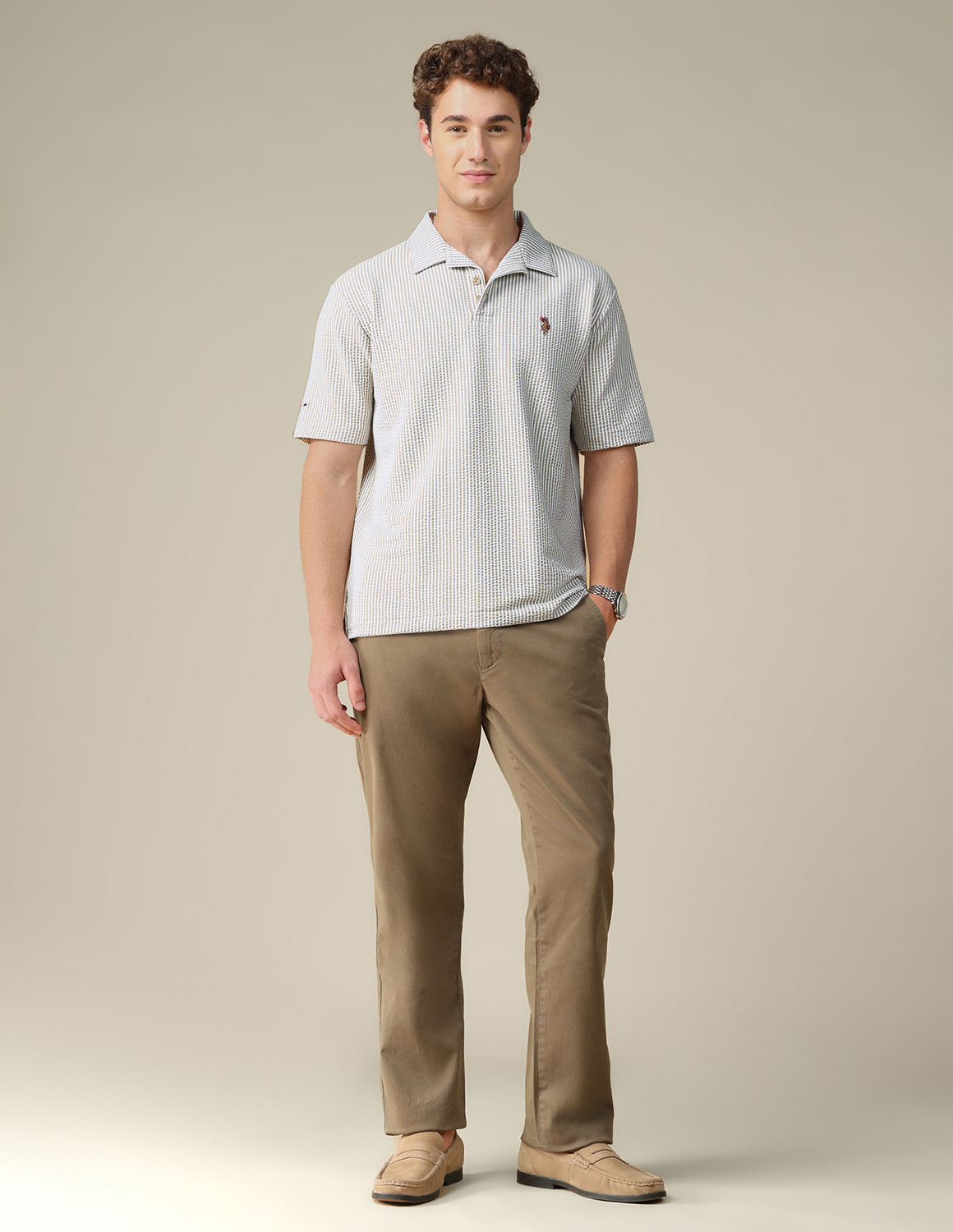 Image of U.S. Polo Assn. Denim Co. Men Self Design Polo Neck Cotton Blend Brown T-Shirt