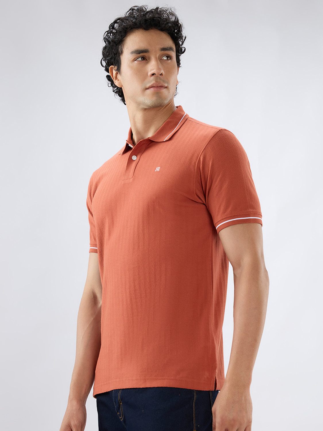 Image of Raymond Solid Men Polo Neck Orange T-Shirt