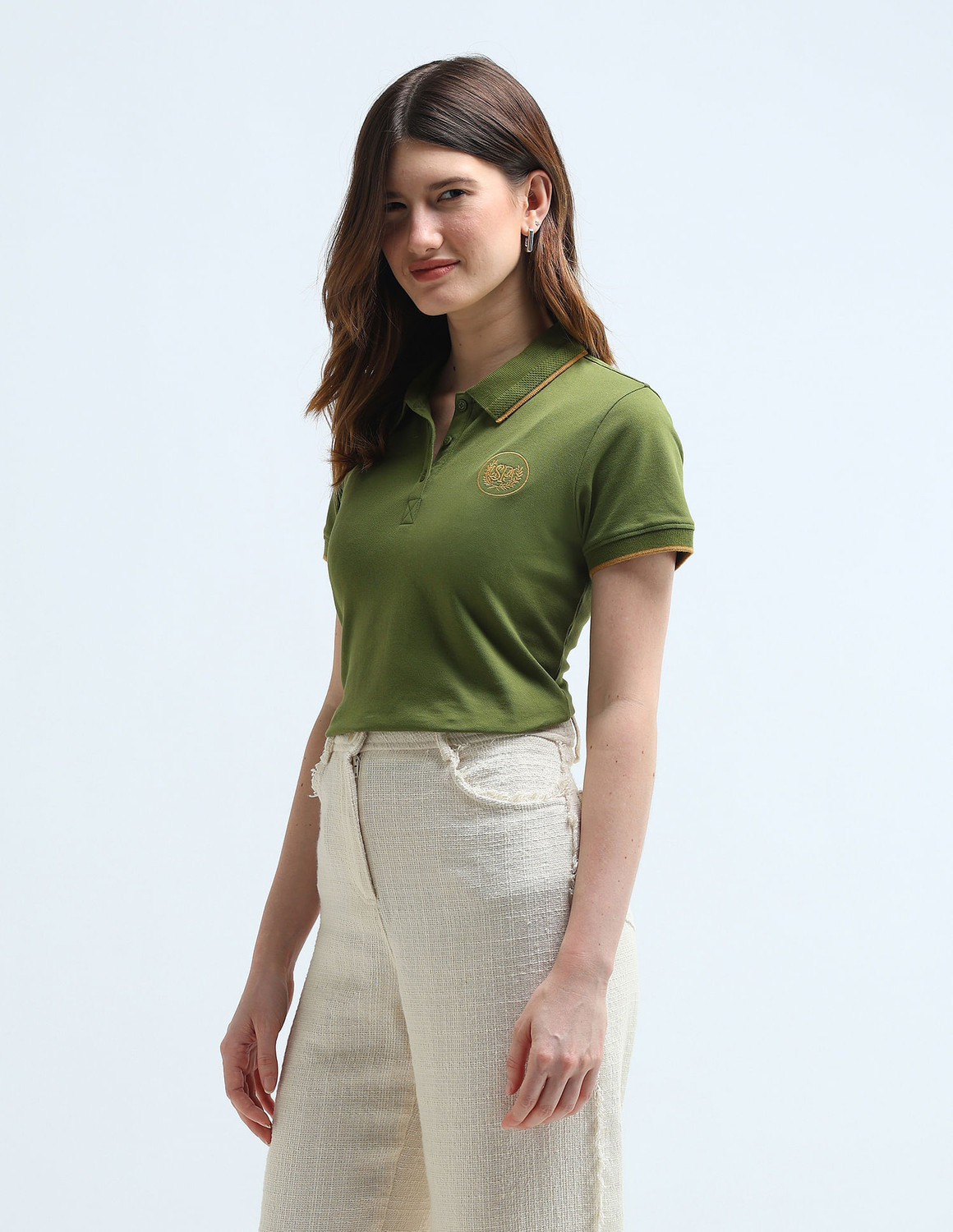 Image of U.S. POLO ASSN. Solid Women Polo Neck Green T-Shirt
