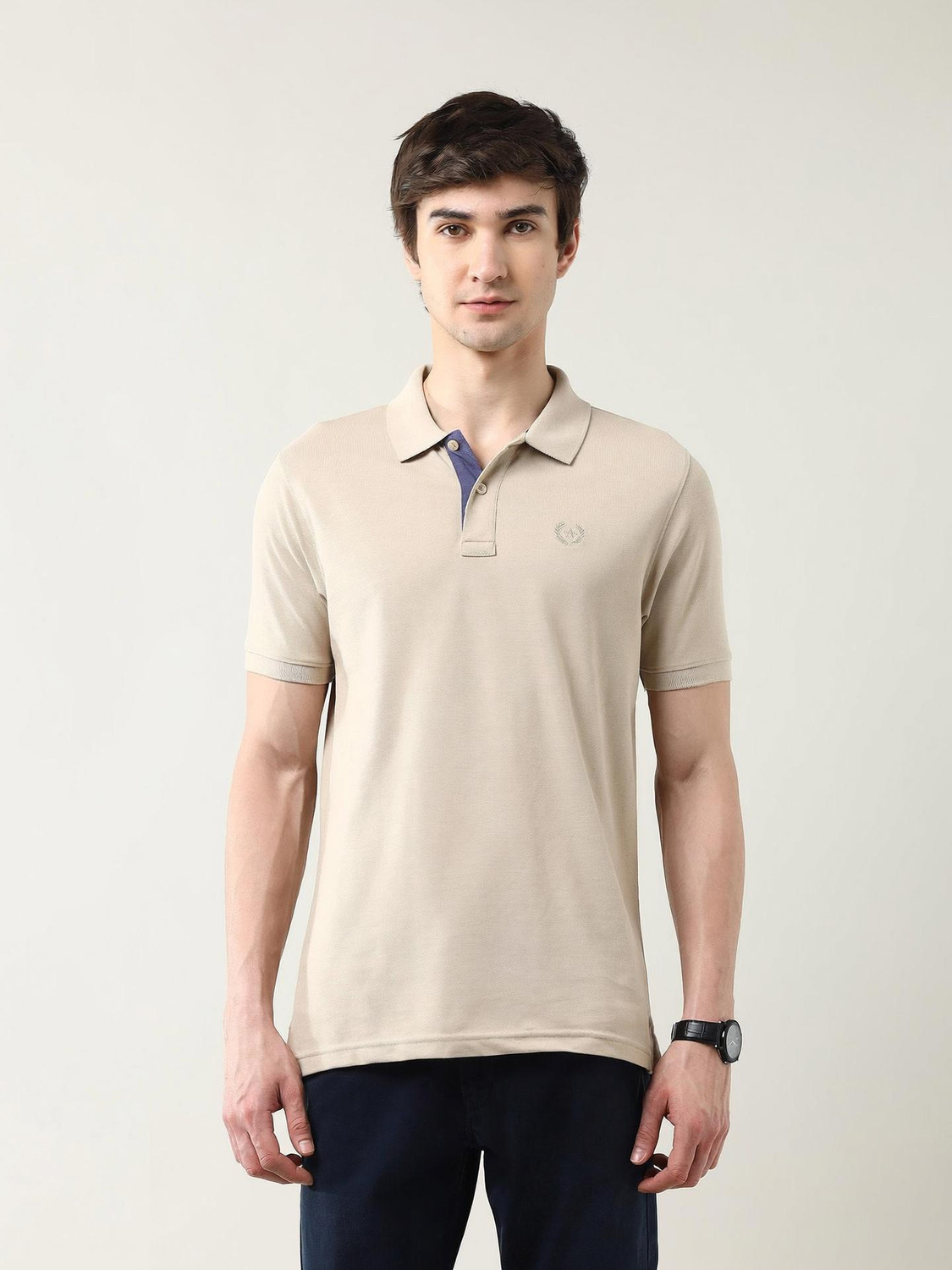 Image of Arrow Sport Solid Men Polo Neck Beige T-Shirt