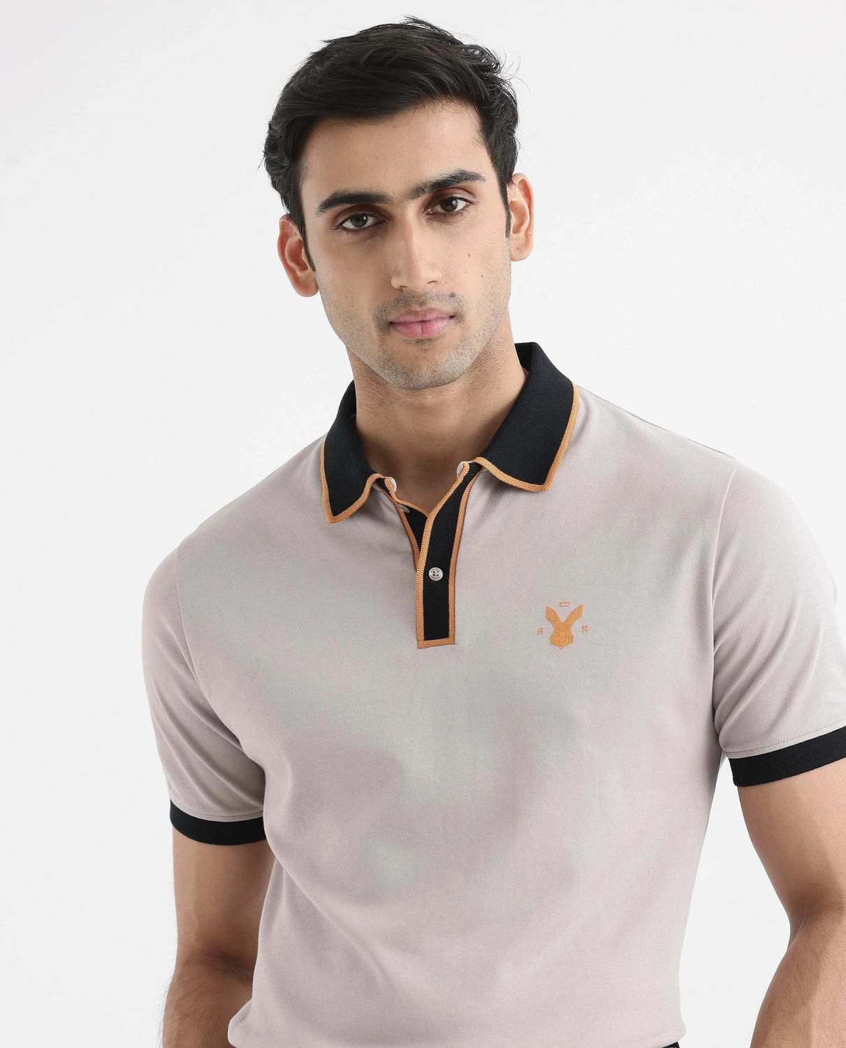 Image of RARE RABBIT Solid Men Polo Neck Beige T-Shirt