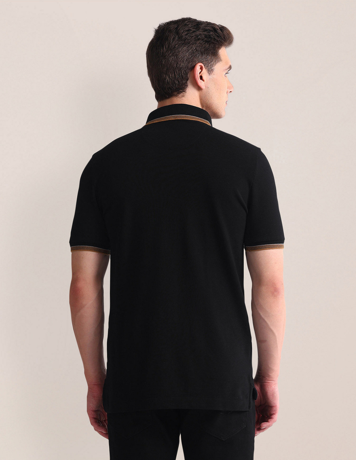 Image of U.S. POLO ASSN. Solid Men Polo Neck Black T-Shirt