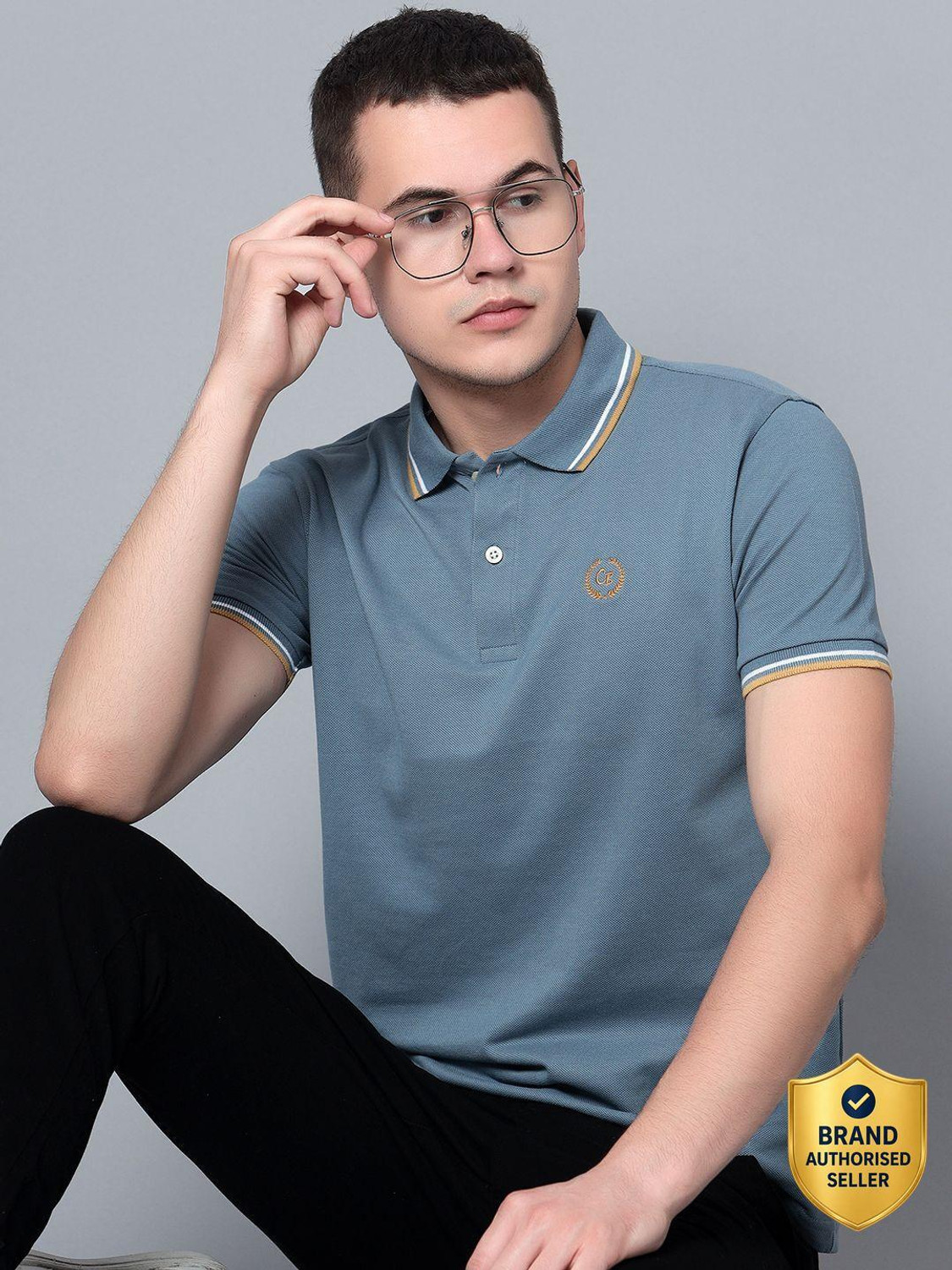 Image of CANTABIL Solid Men Polo Neck Blue T-Shirt