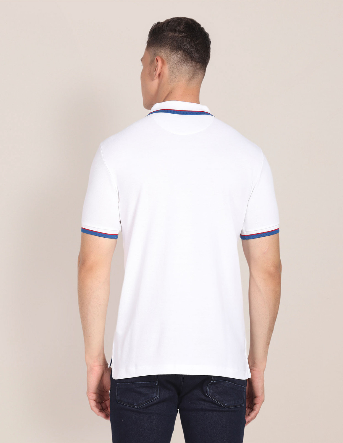 Image of U.S. POLO ASSN. Solid Men Polo Neck White T-Shirt