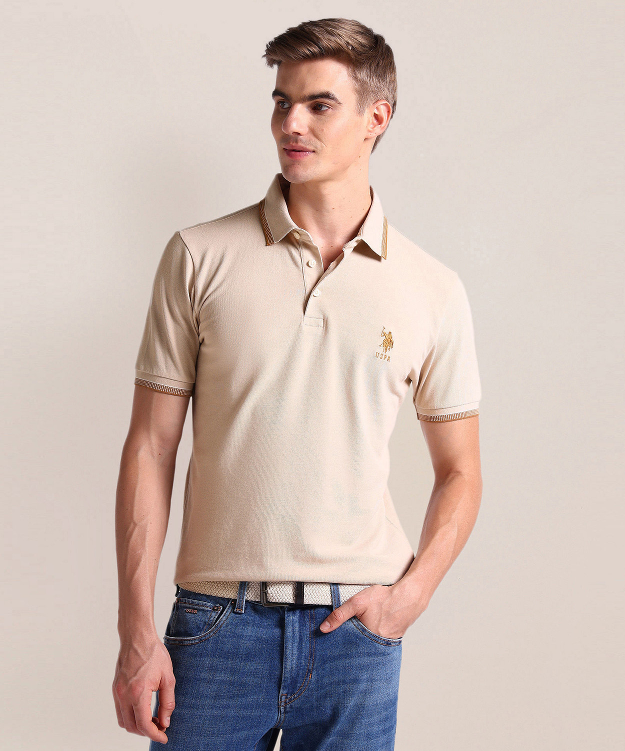 Image of U.S. POLO ASSN. Men Solid Polo Neck Cotton Blend Beige T-Shirt