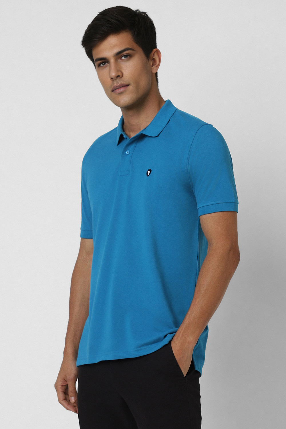 Image of VAN HEUSEN SPORT Self Design Men Polo Neck Blue T-Shirt