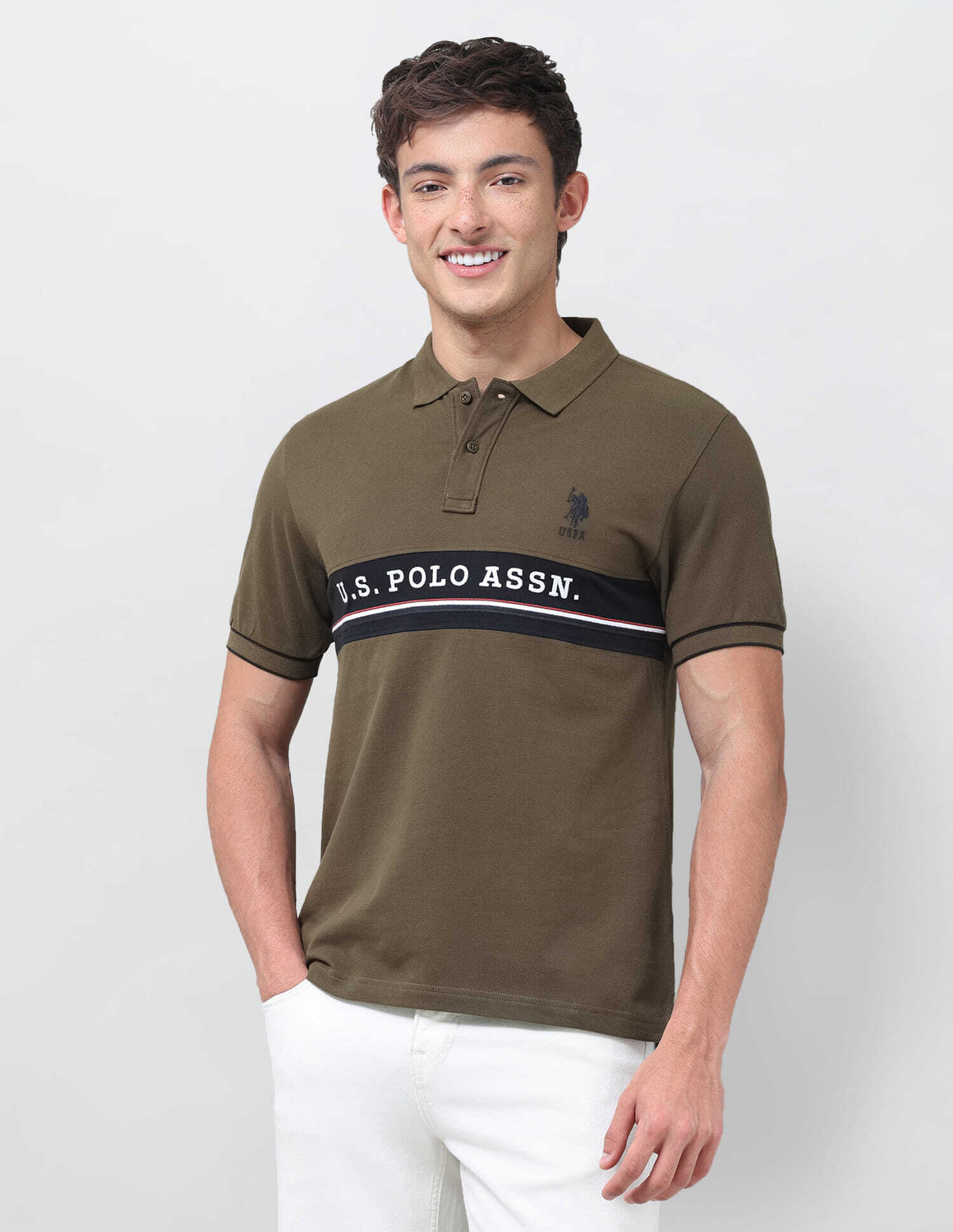 Image of U.S. POLO ASSN. Solid Men Polo Neck Green T-Shirt