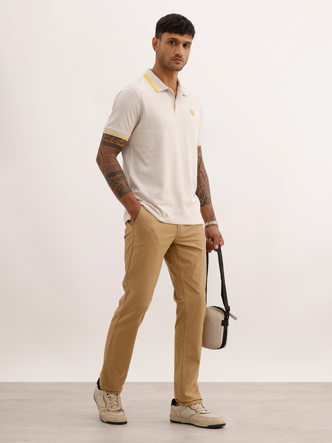 Image of WROGN Solid Men Polo Neck Beige T-Shirt