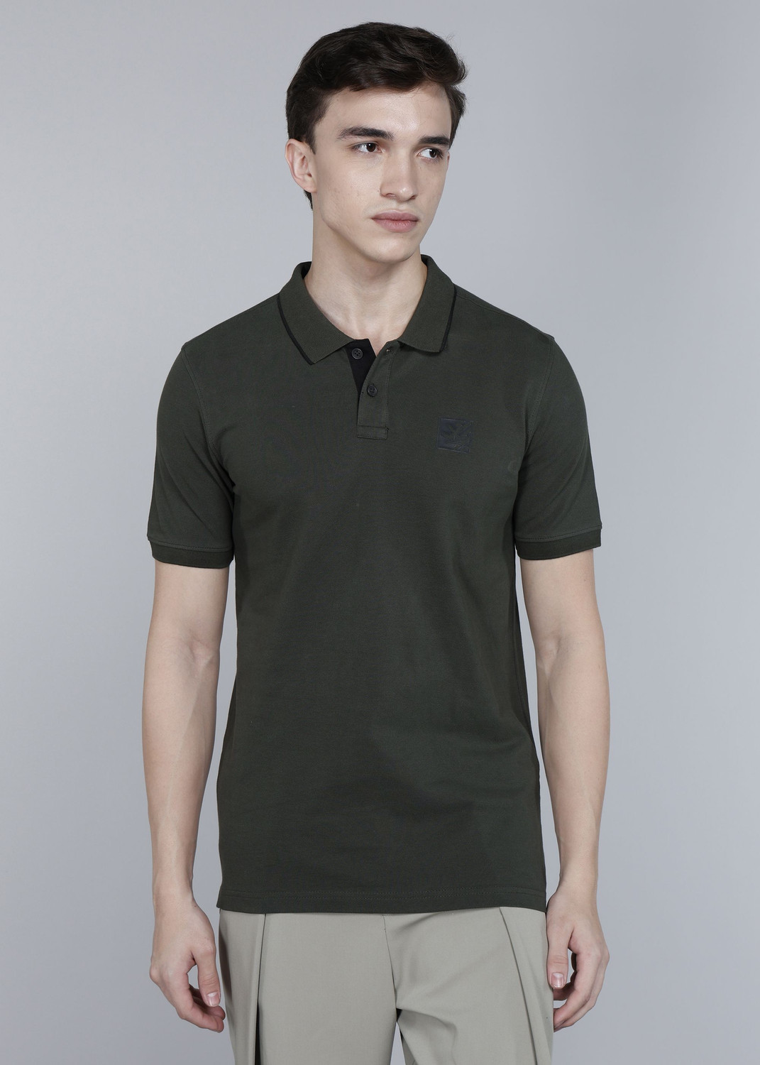 Image of WROGN Men Solid Polo Neck Pure Cotton Green T-Shirt
