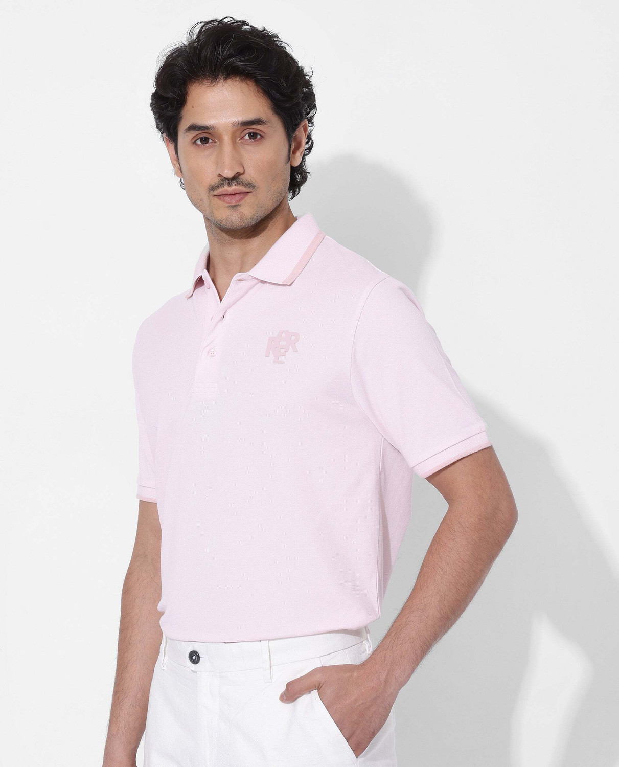 Image of RARE RABBIT Solid Men Polo Neck Pink T-Shirt