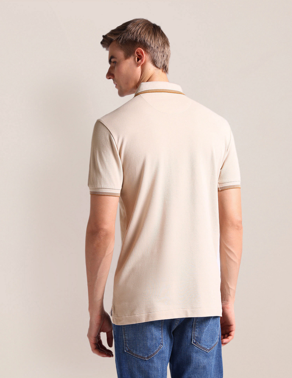 Image of U.S. POLO ASSN. Men Solid Polo Neck Cotton Blend Beige T-Shirt