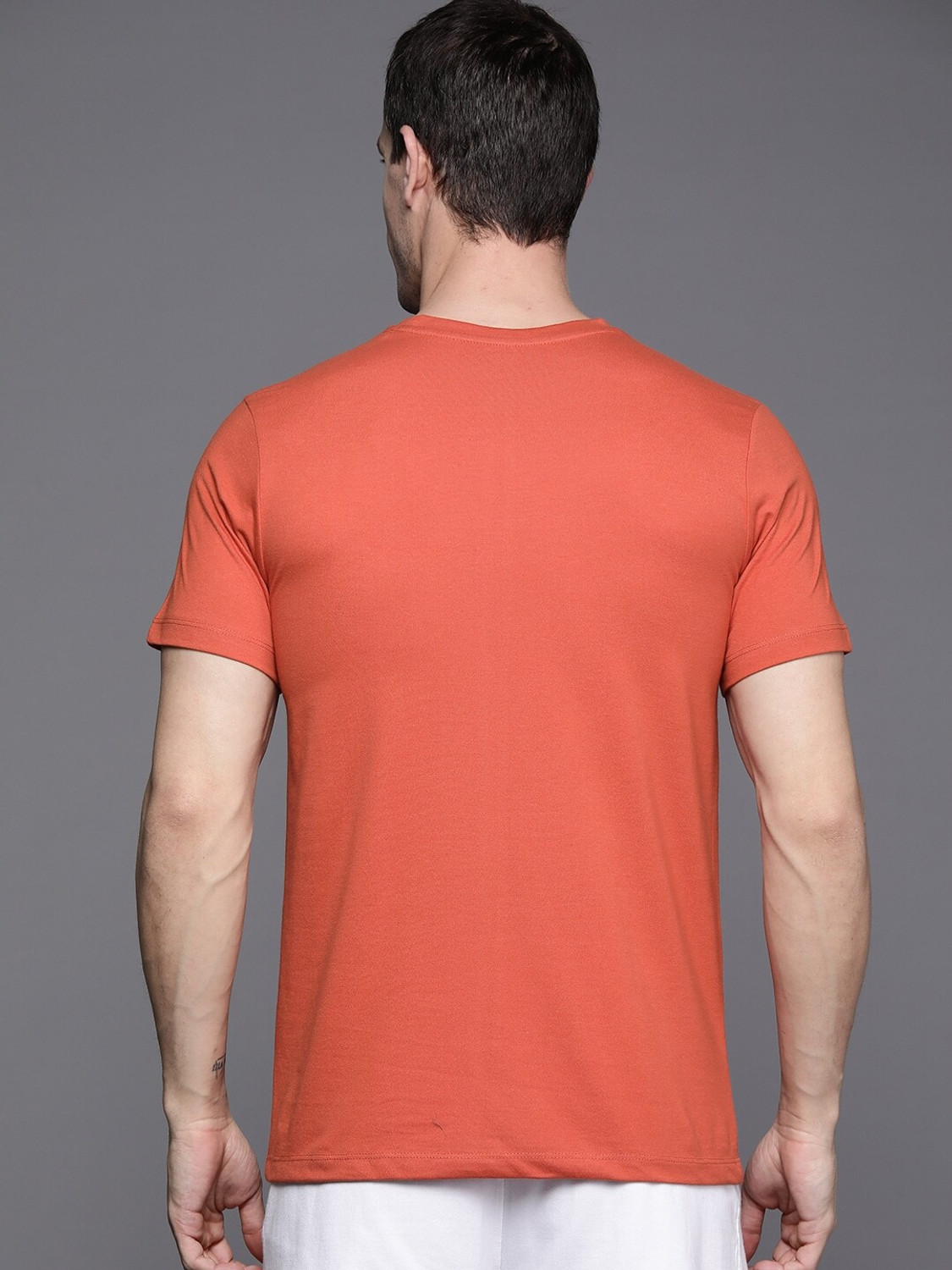 Image of HRX by Hrithik Roshan Printed Men Round Neck Orange T-Shirt