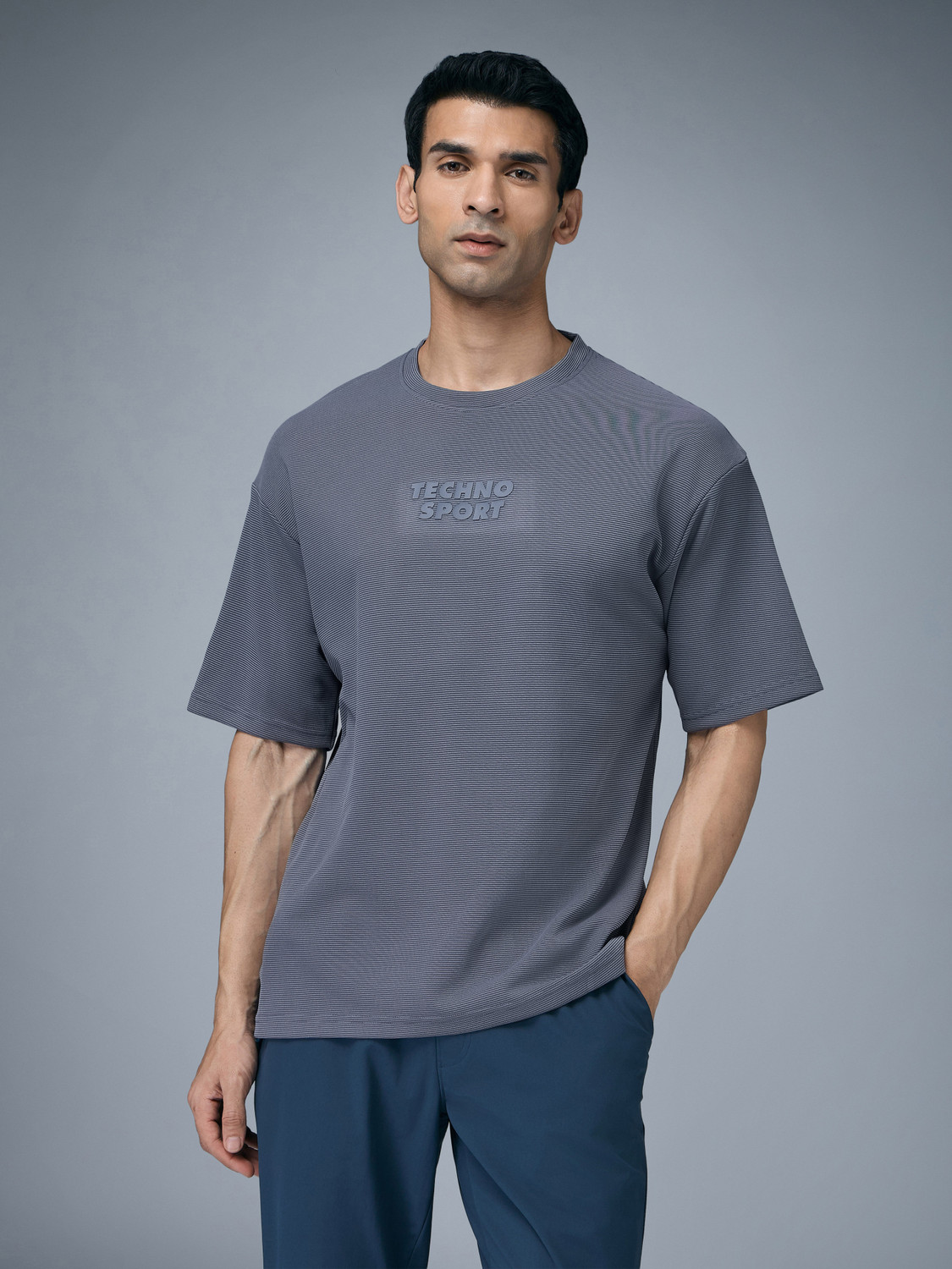 Image of TECHNOSPORT Self Design Men Round Neck Light Blue T-Shirt