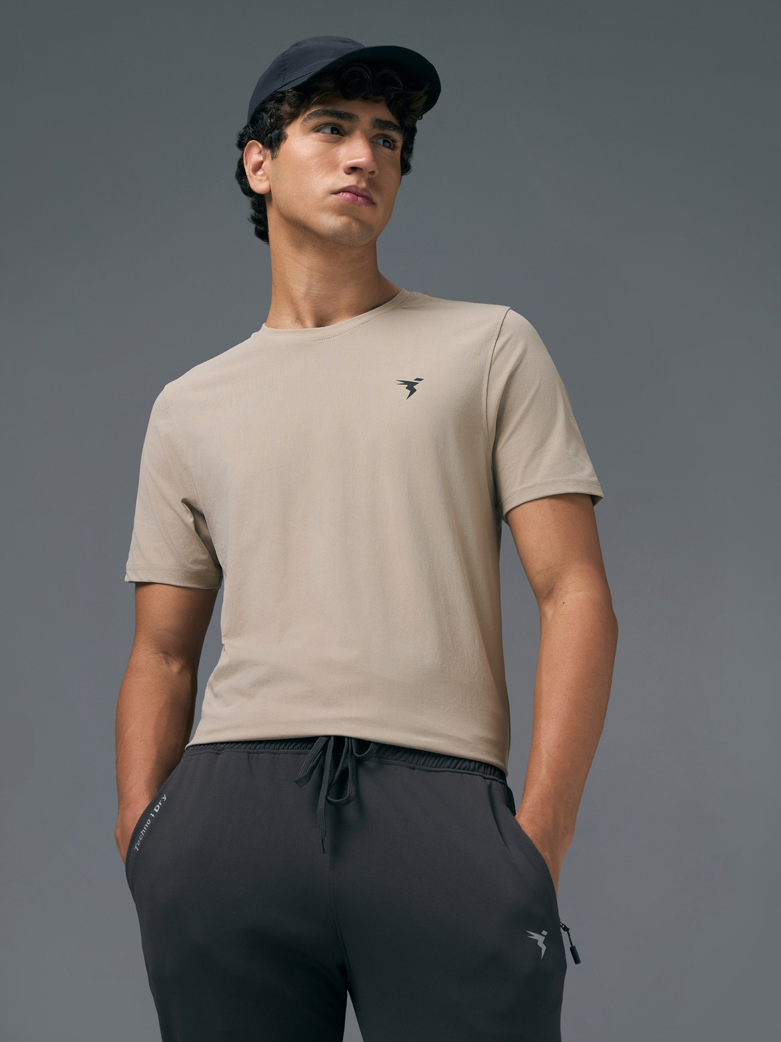 Image of TECHNOSPORT Solid Men Round Neck Beige T-Shirt