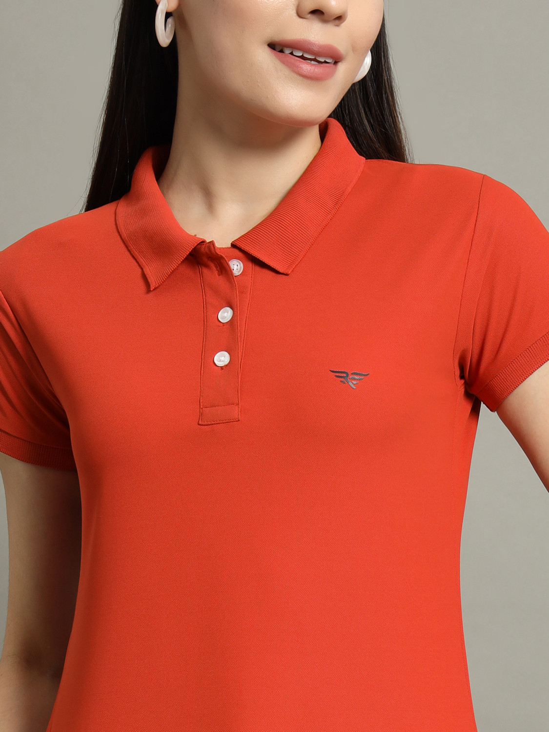 Image of RISS Solid Women Polo Neck Orange T-Shirt