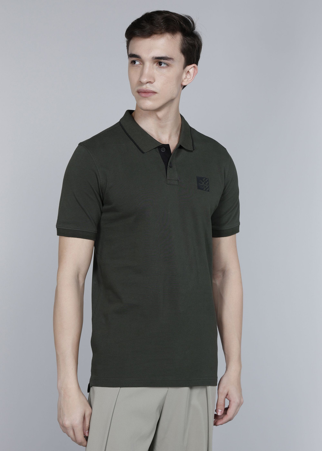 Image of WROGN Men Solid Polo Neck Pure Cotton Green T-Shirt