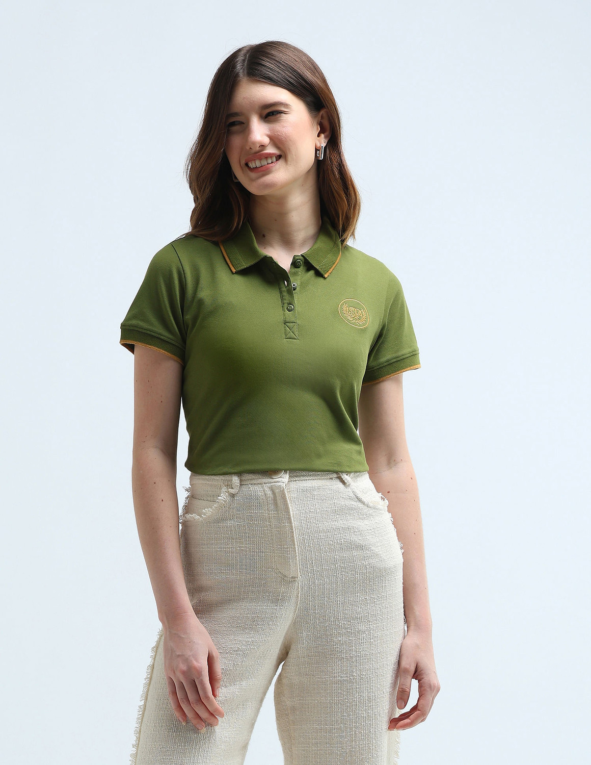 Image of U.S. POLO ASSN. Solid Women Polo Neck Green T-Shirt