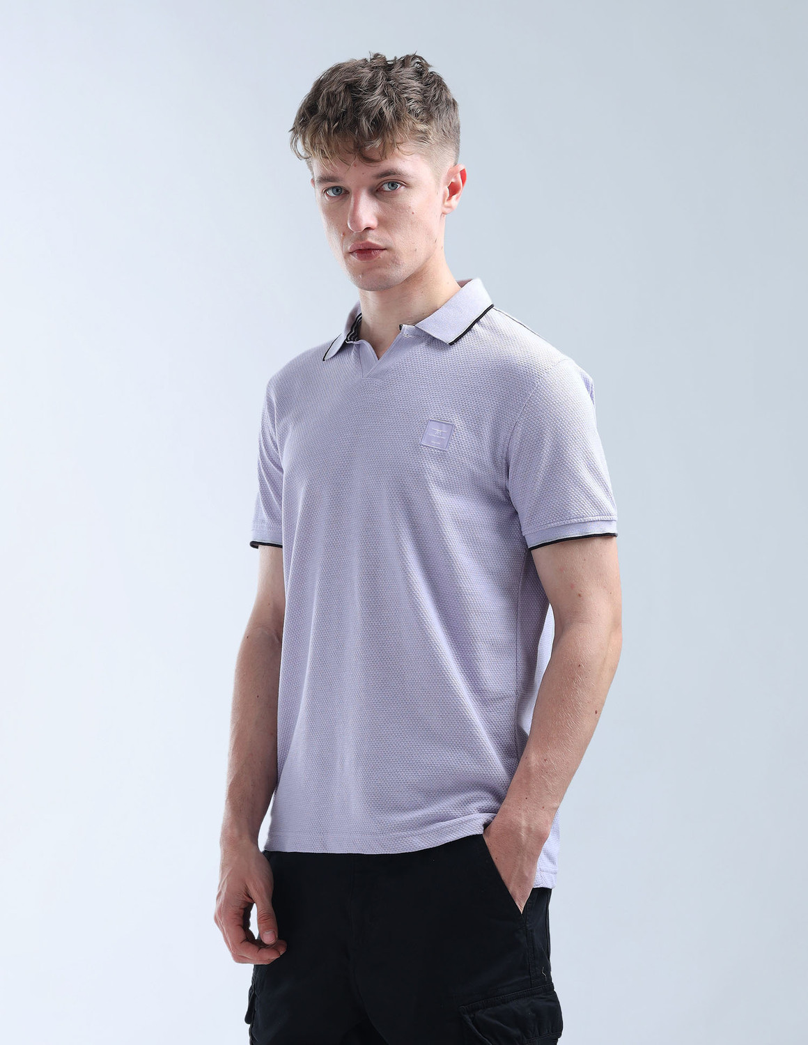 Image of FLYING MACHINE Self Design Men Polo Neck Purple T-Shirt