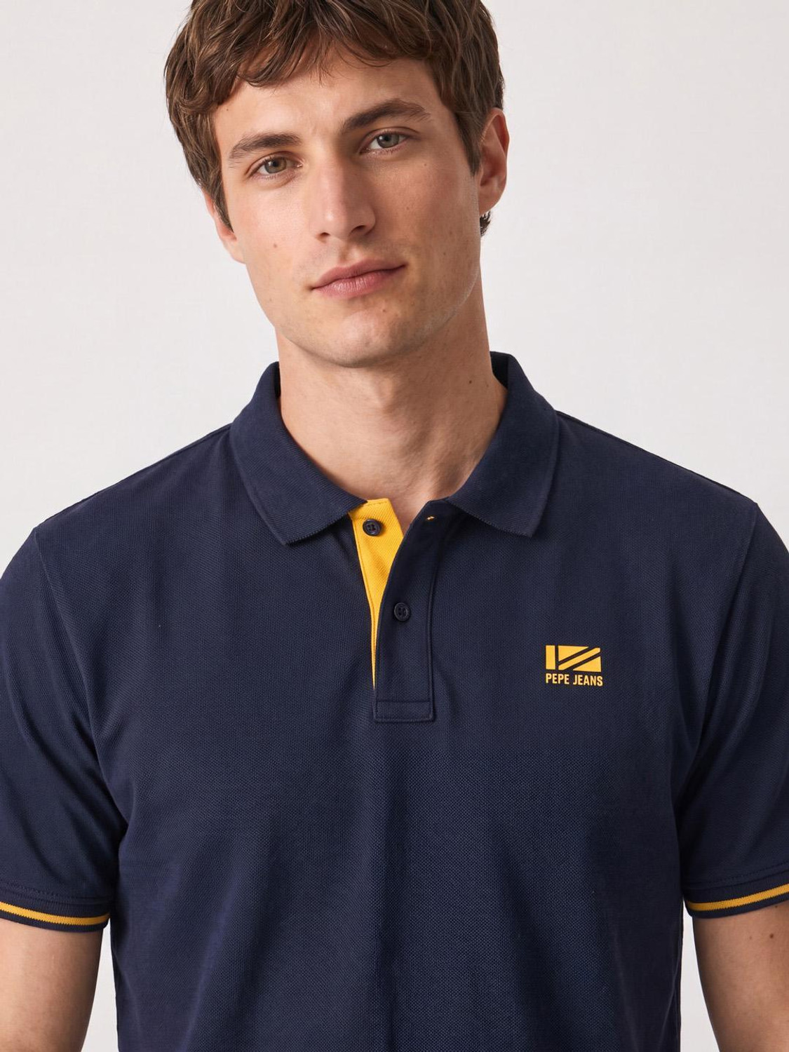 Image of Pepe Jeans Men Solid Polo Neck Polycotton Blue T-Shirt