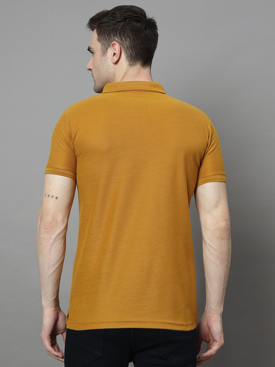 Image of RARHANPREMIUM Solid Men Polo Neck Yellow T-Shirt
