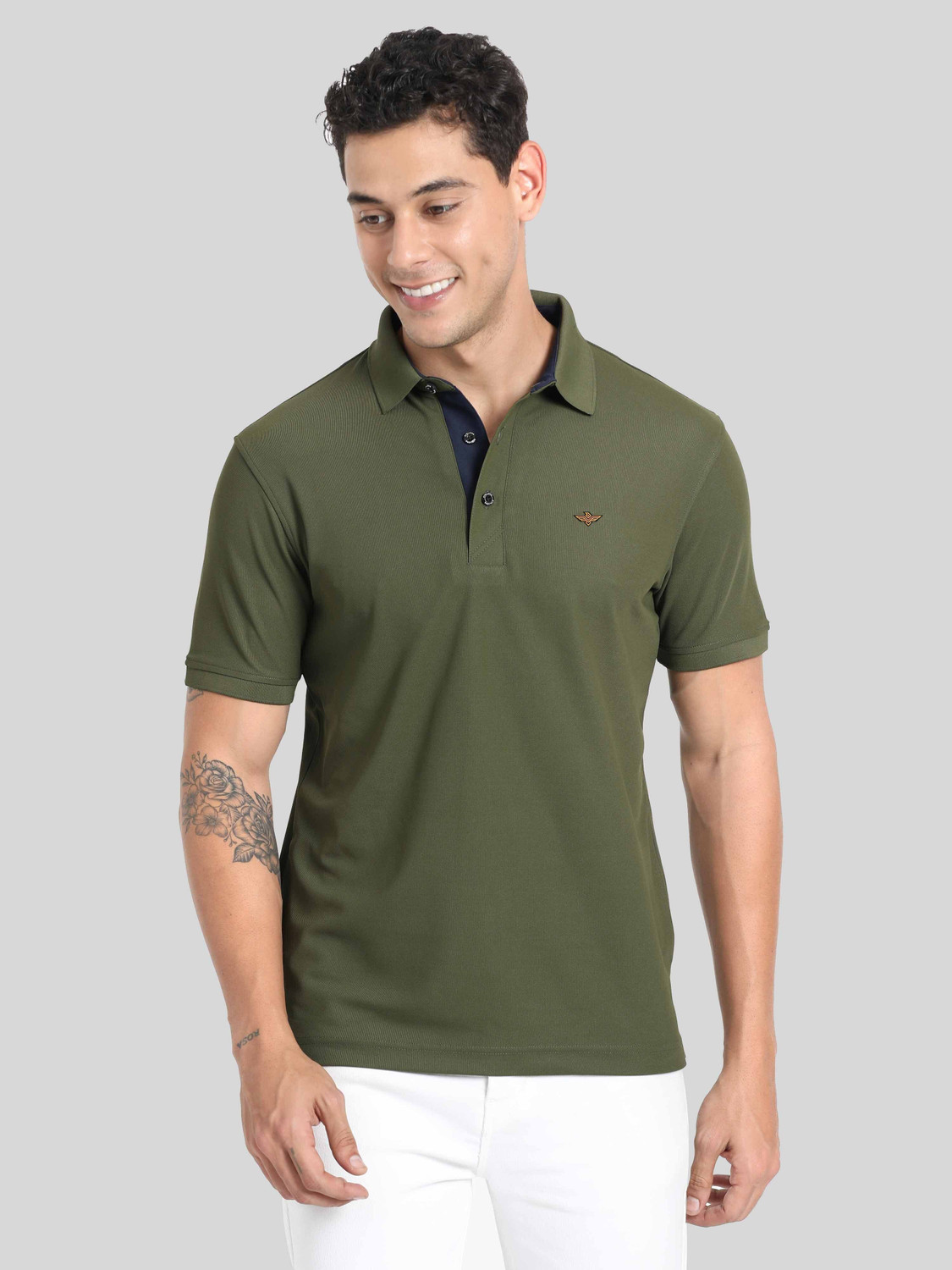 Image of Stellers Solid Men Polo Neck Dark Green T-Shirt