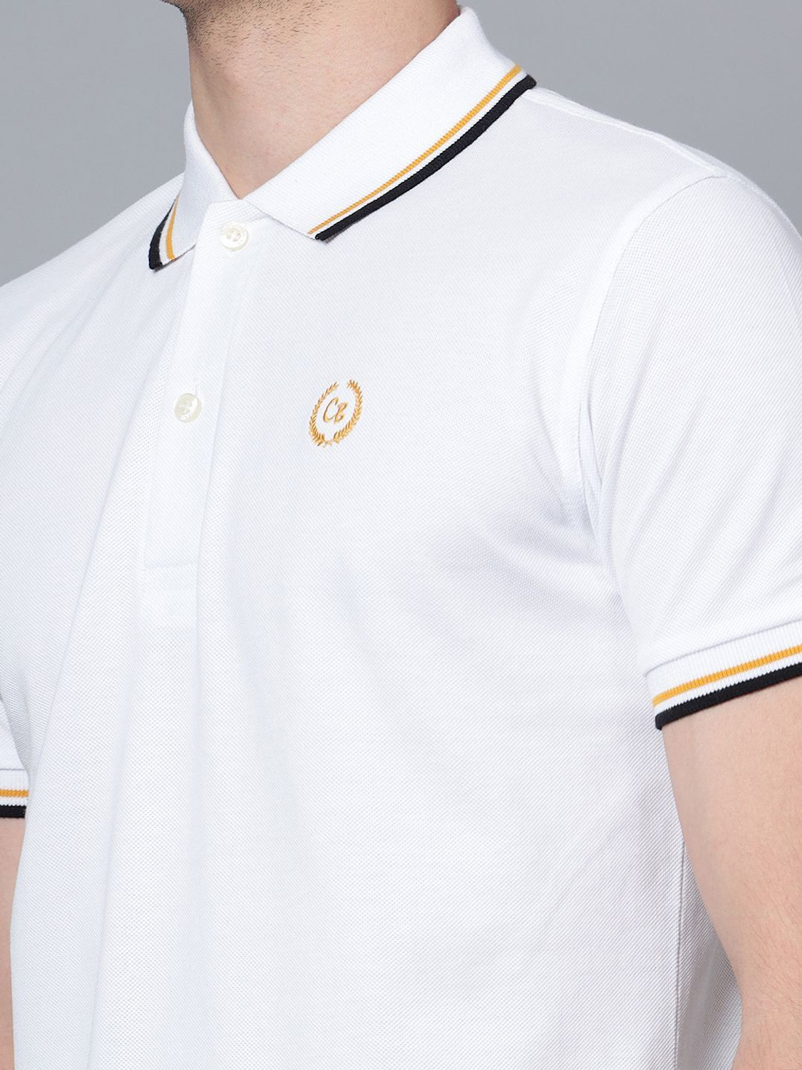 Image of CANTABIL Solid Men Polo Neck White T-Shirt