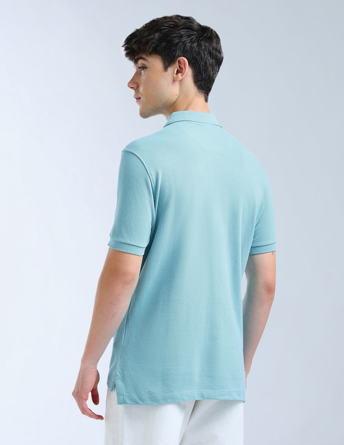 Image of FLYING MACHINE Solid Men Polo Neck Blue T-Shirt