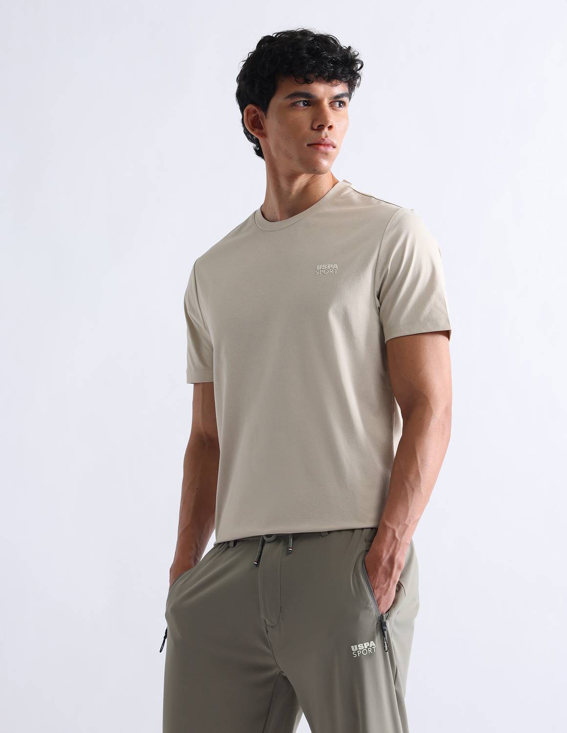 U.S. POLO ASSN. Men Solid Round Neck Polyester Beige T-Shirt