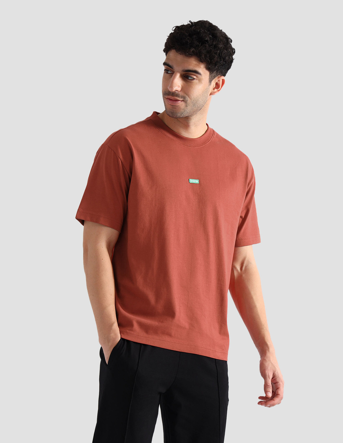 Image of U.S. POLO ASSN. Solid Men Crew Neck Orange T-Shirt