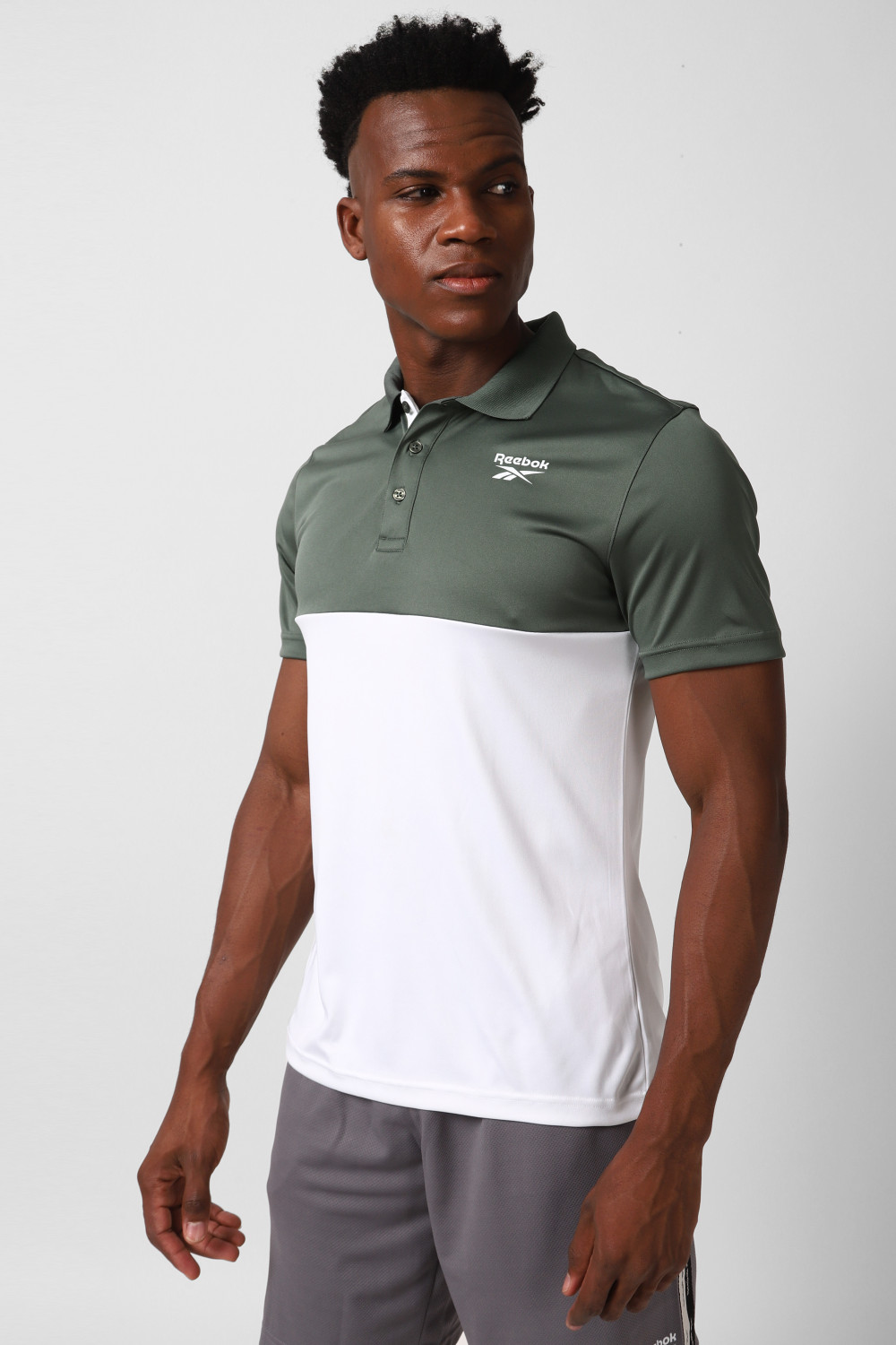 Image of REEBOK Solid Men Mandarin Collar Black T-Shirt