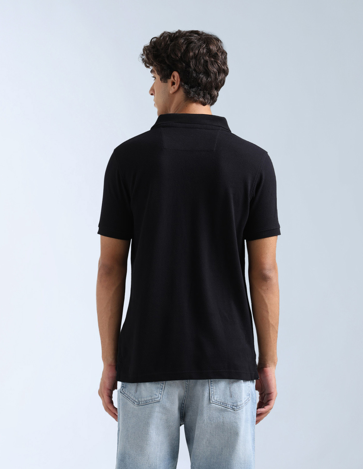 Image of FLYING MACHINE Self Design Men Polo Neck Black T-Shirt
