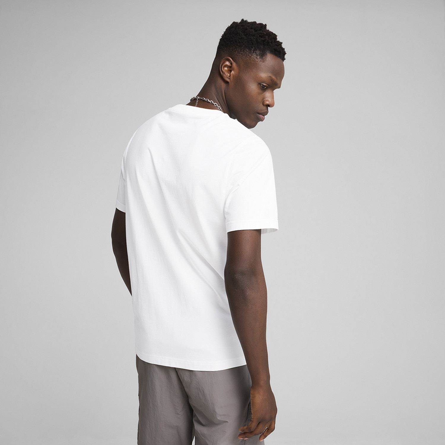 Image of PUMA Solid Men Round Neck White T-Shirt