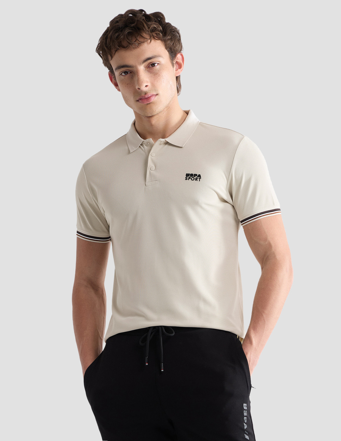 Image of U.S. POLO ASSN. Solid Men Polo Neck Beige T-Shirt