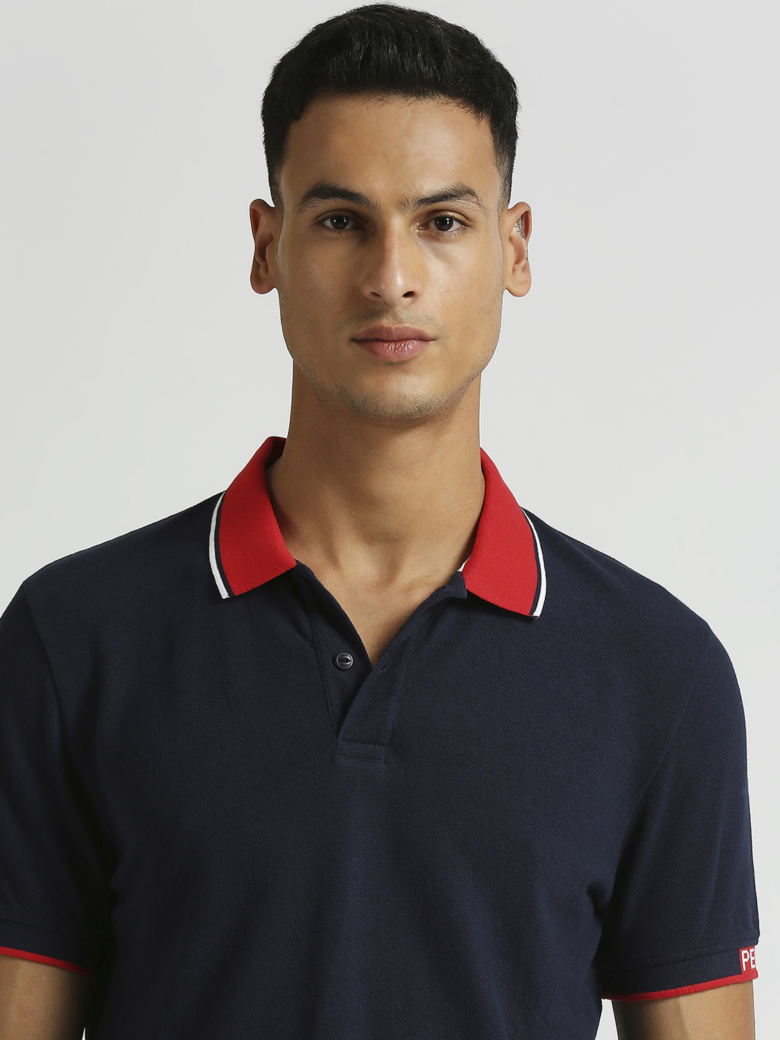 Image of Pepe Jeans Solid Men Polo Neck Blue T-Shirt