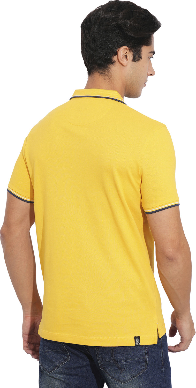 Image of BEING HUMAN Solid Men Polo Neck Yellow T-Shirt