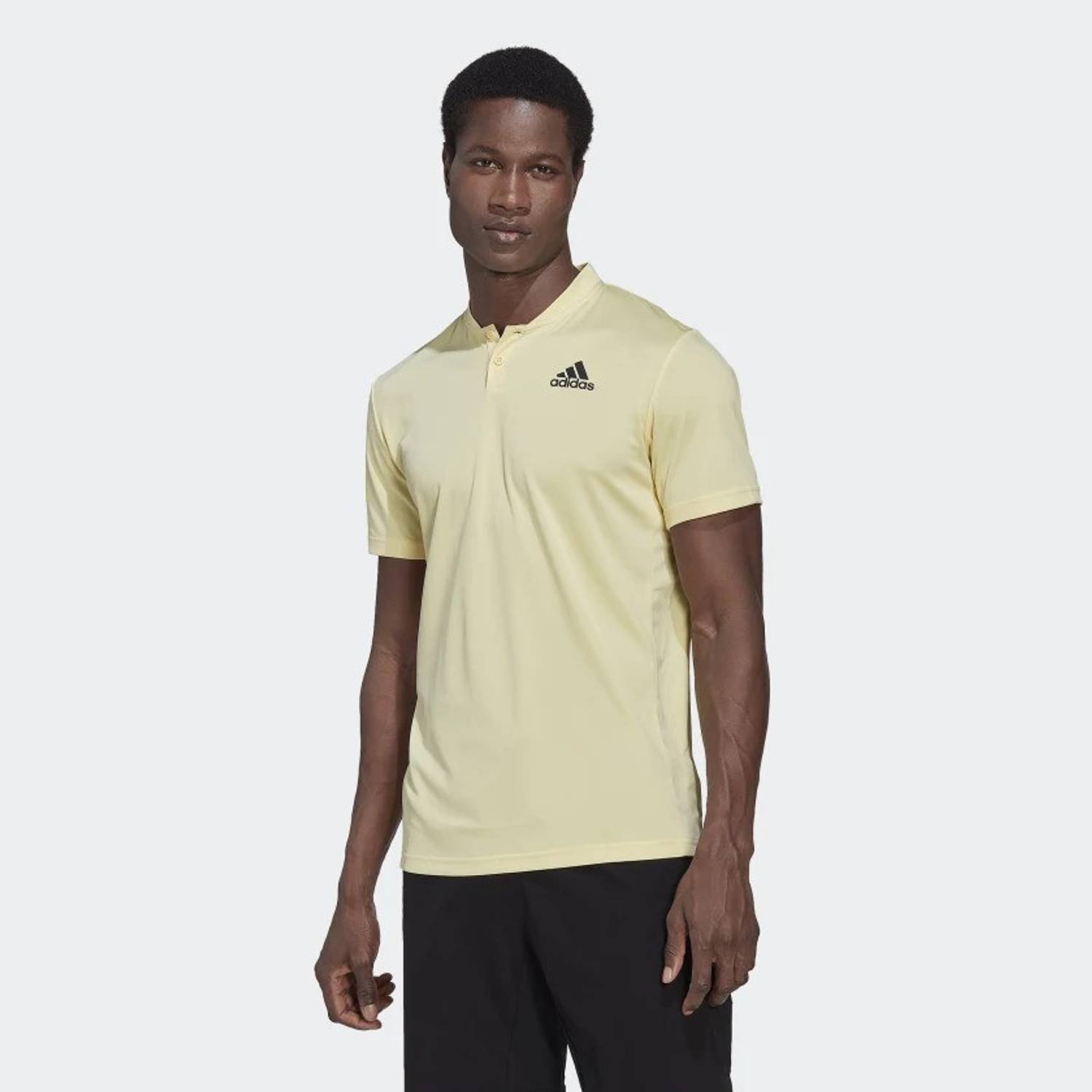 ADIDAS Solid Men Round Neck Yellow T-Shirt