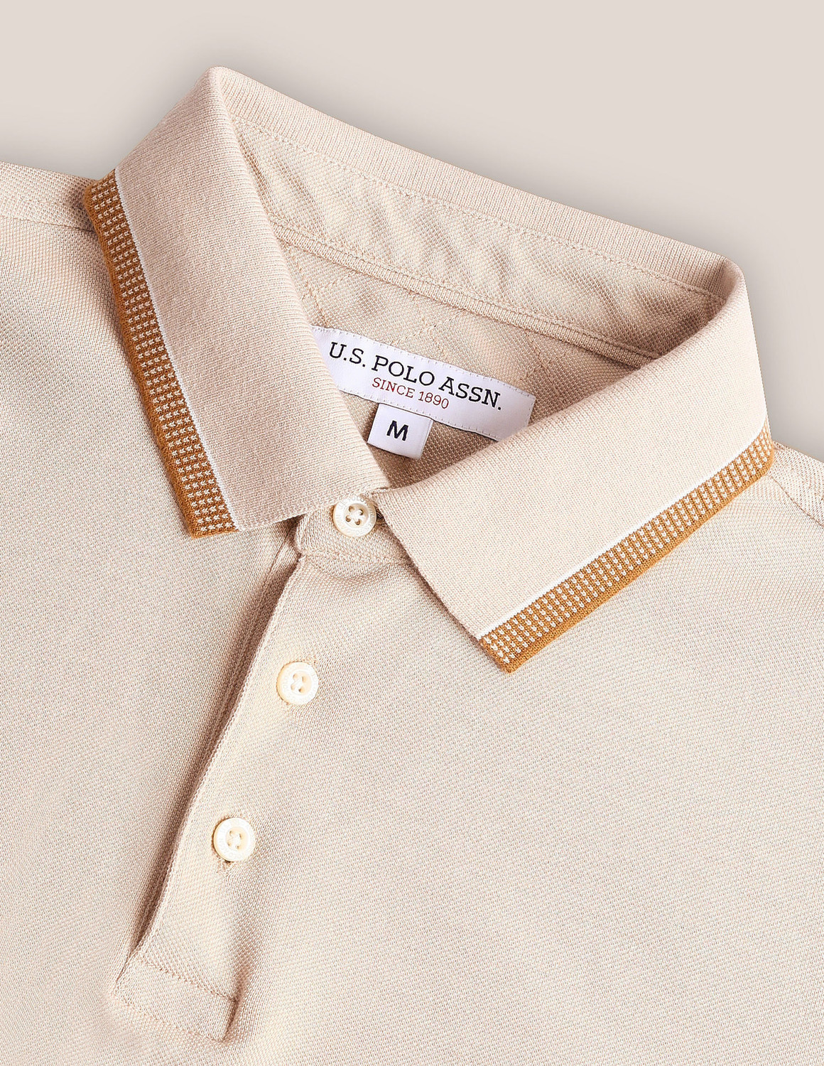 Image of U.S. POLO ASSN. Men Solid Polo Neck Cotton Blend Beige T-Shirt